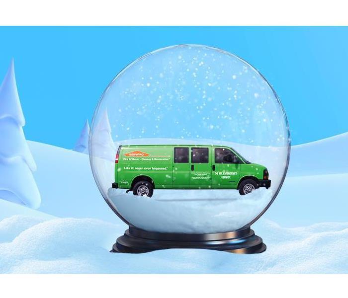 SERVPRO van inside a snowglobe with wintry scene